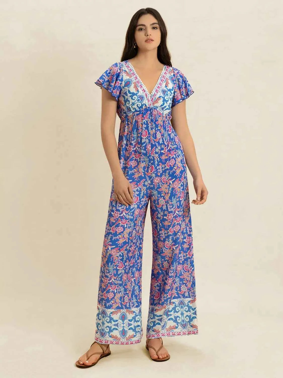 Printed V-Neck Wide Leg Jumpsuit Trendsi