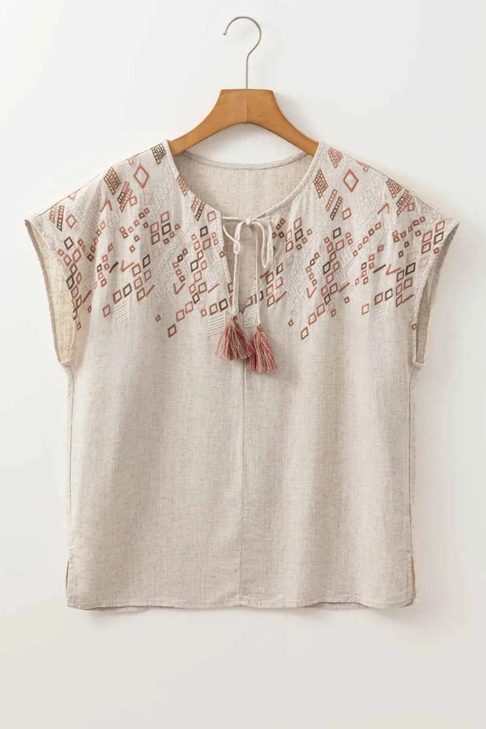 Geometric Embroidered Short Sleeve Tassel Tie Neck Blouse Trendsi