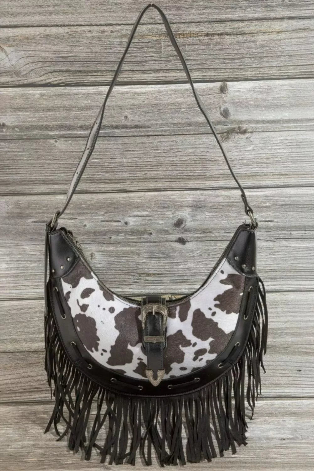 Fame Cow Print Faux Leather Fringe Hobo Bag Trendsi