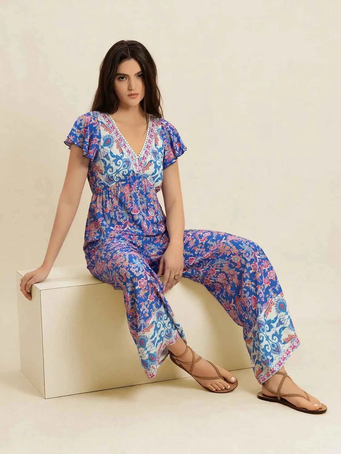 Printed V-Neck Wide Leg Jumpsuit Trendsi