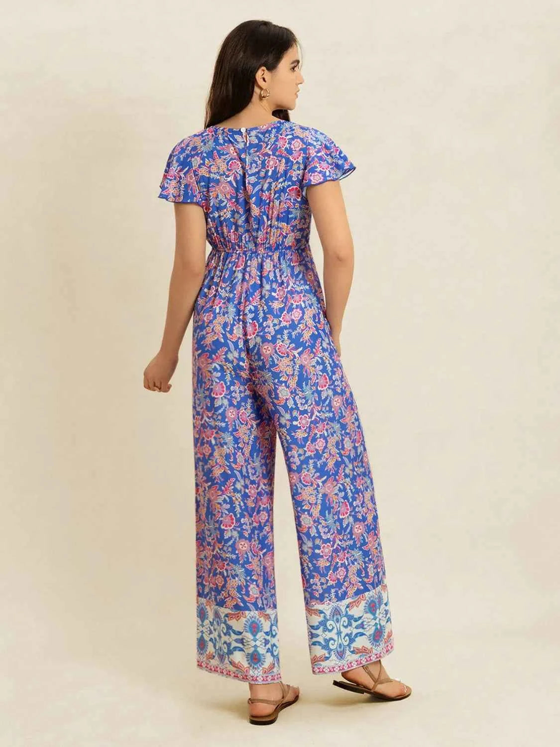Printed V-Neck Wide Leg Jumpsuit Trendsi