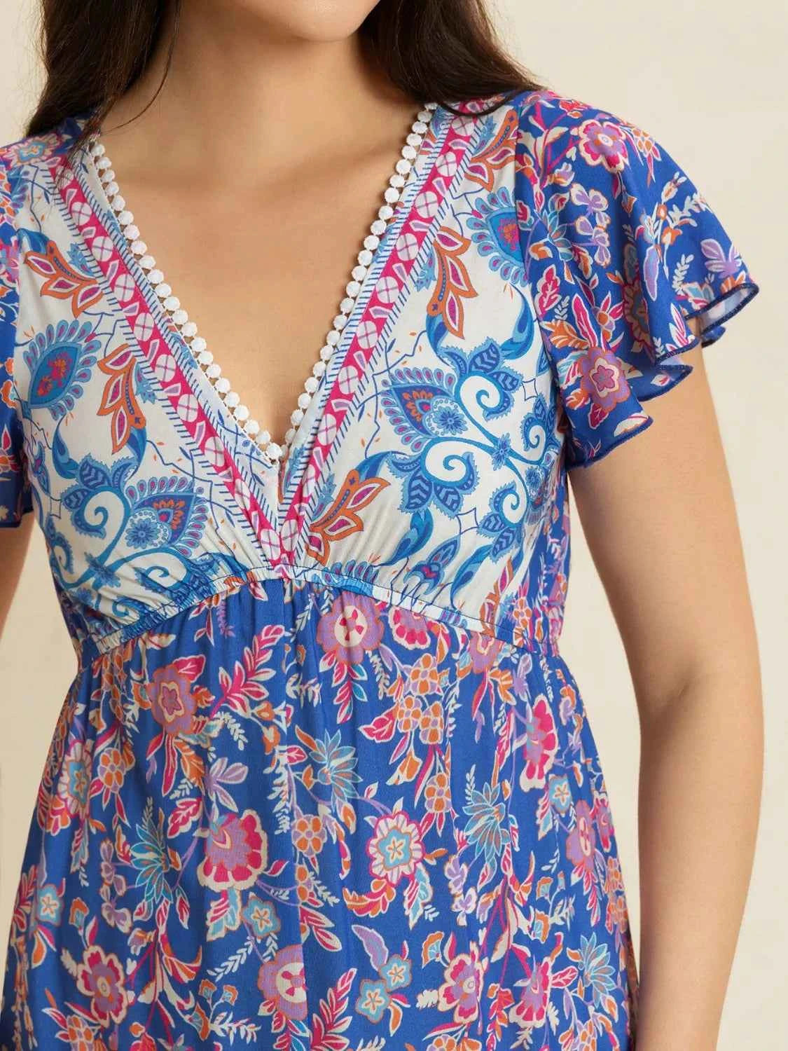 Printed V-Neck Wide Leg Jumpsuit Trendsi