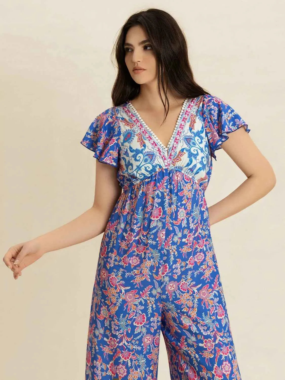 Printed V-Neck Wide Leg Jumpsuit Trendsi