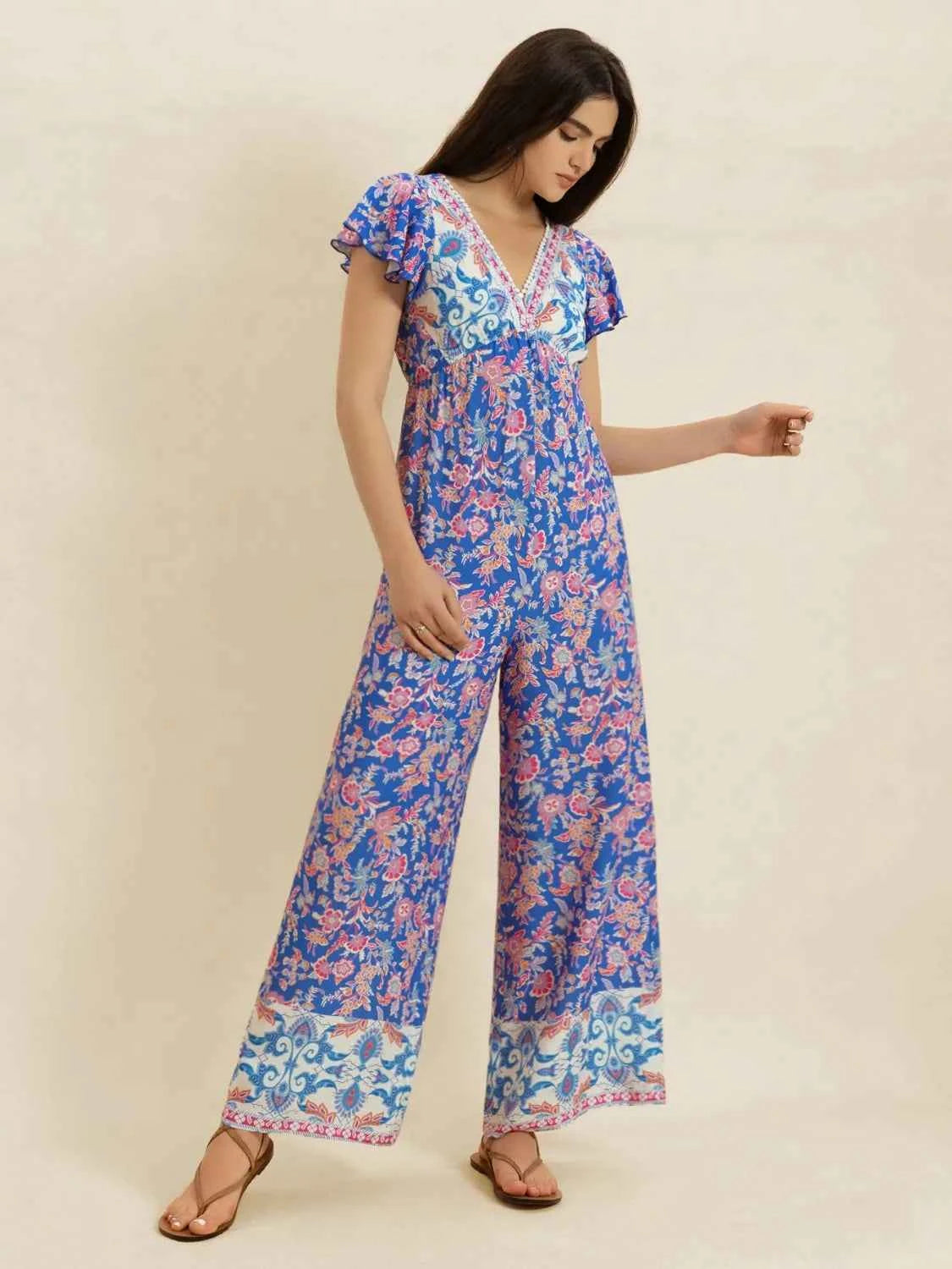 Printed V-Neck Wide Leg Jumpsuit Trendsi